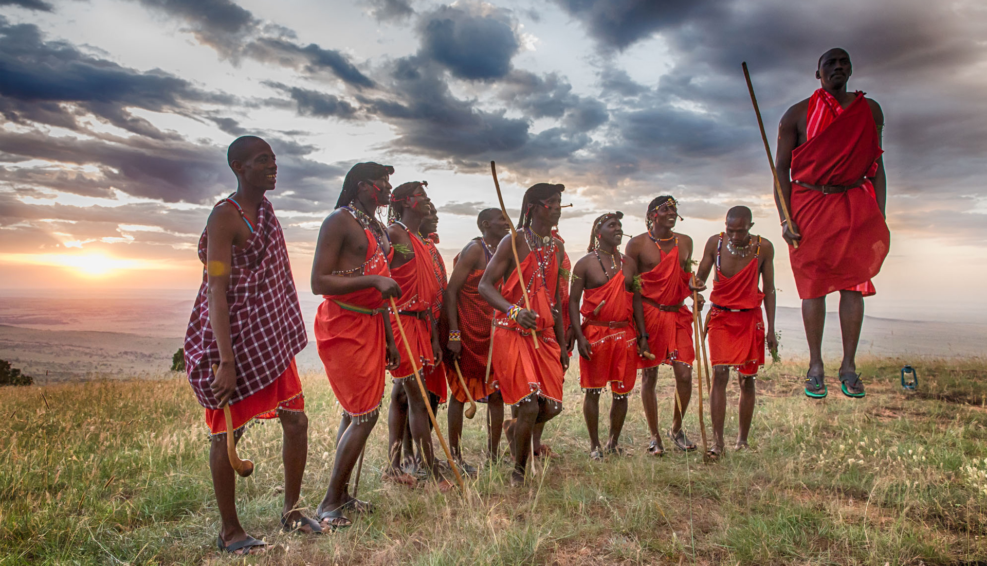 /wp-content/uploads/2022/06/Massai-warriors-jumping-with-sunset-copy.jpg