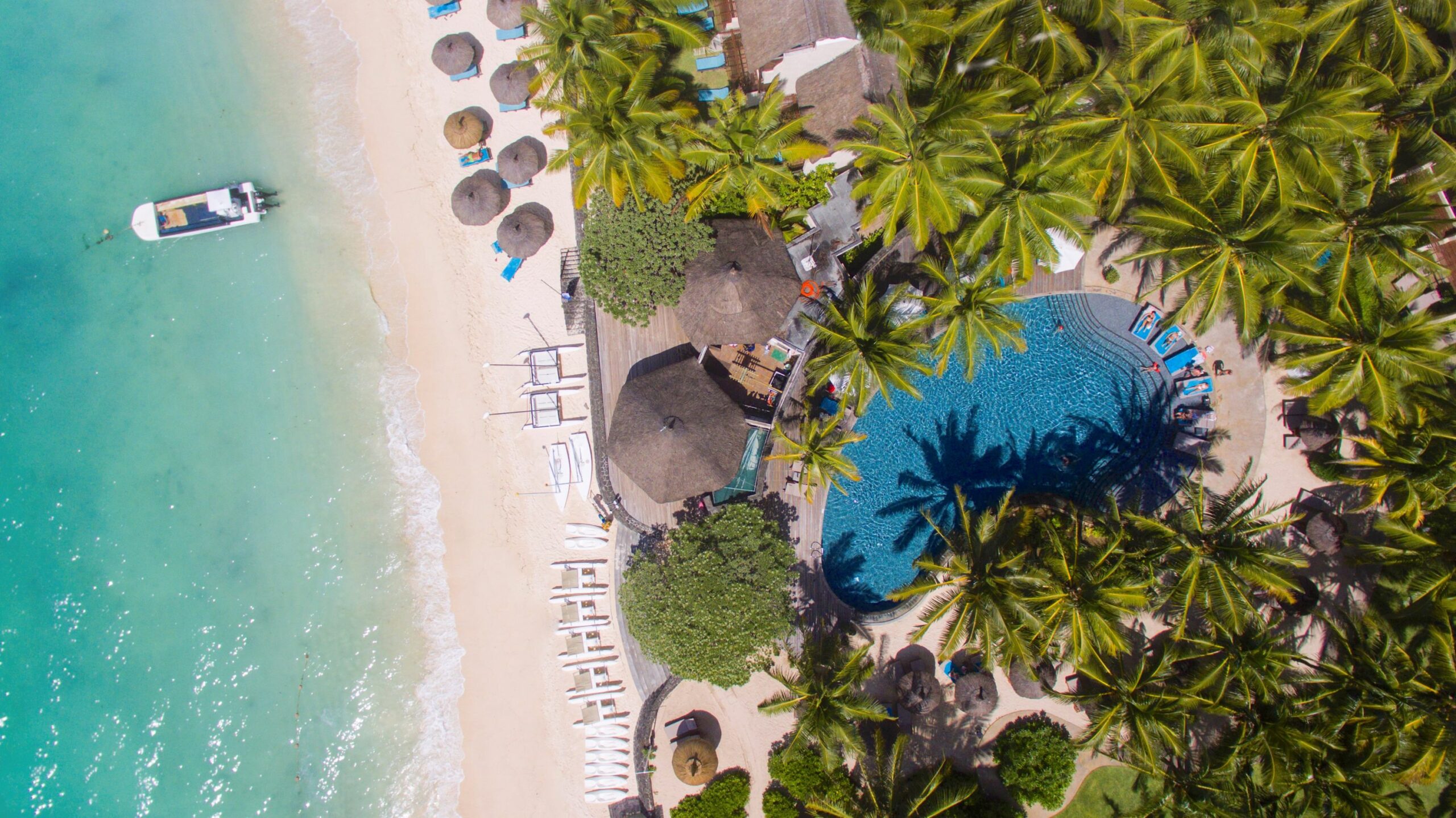 https://www.trackssafaris.co.uk/wp-content/uploads/2022/06/belle-mare-plage-2017-wedo-aerial-07_hd-copy-scaled.jpg
