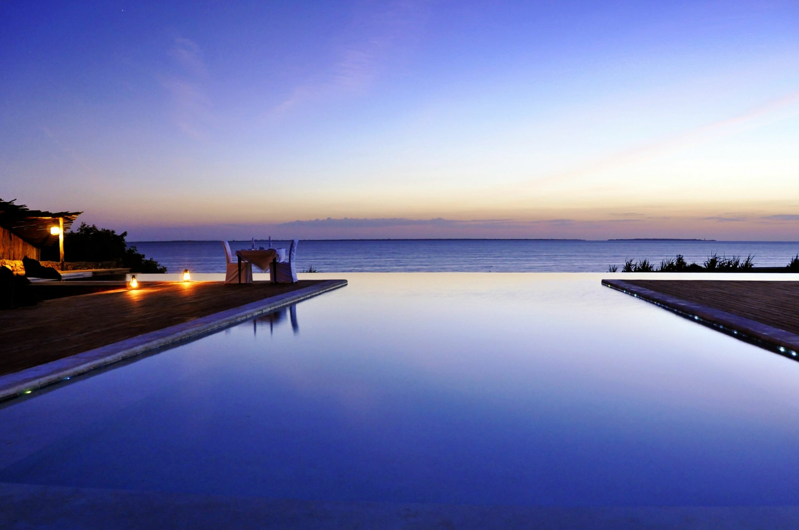 https://www.trackssafaris.co.uk/wp-content/uploads/2022/06/kilindi_infinity_pool-2-scaled.jpg