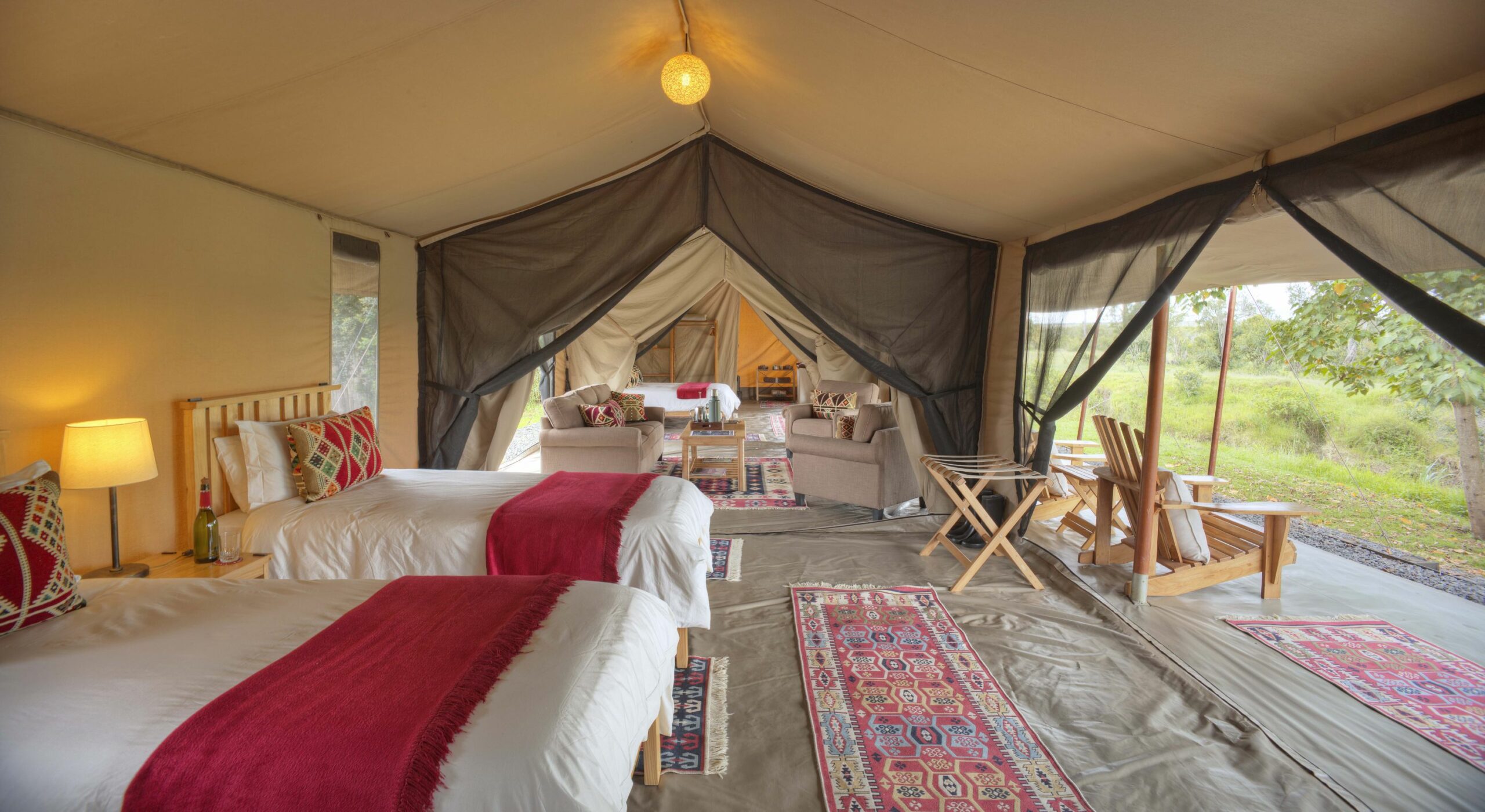 /wp-content/uploads/2022/07/Asilia-Ol-Pejeta-Bush-Camp-Family-Room-Twin-set-up-with-view-into-lounge-and-main-bedroom-copy-scaled.jpg
