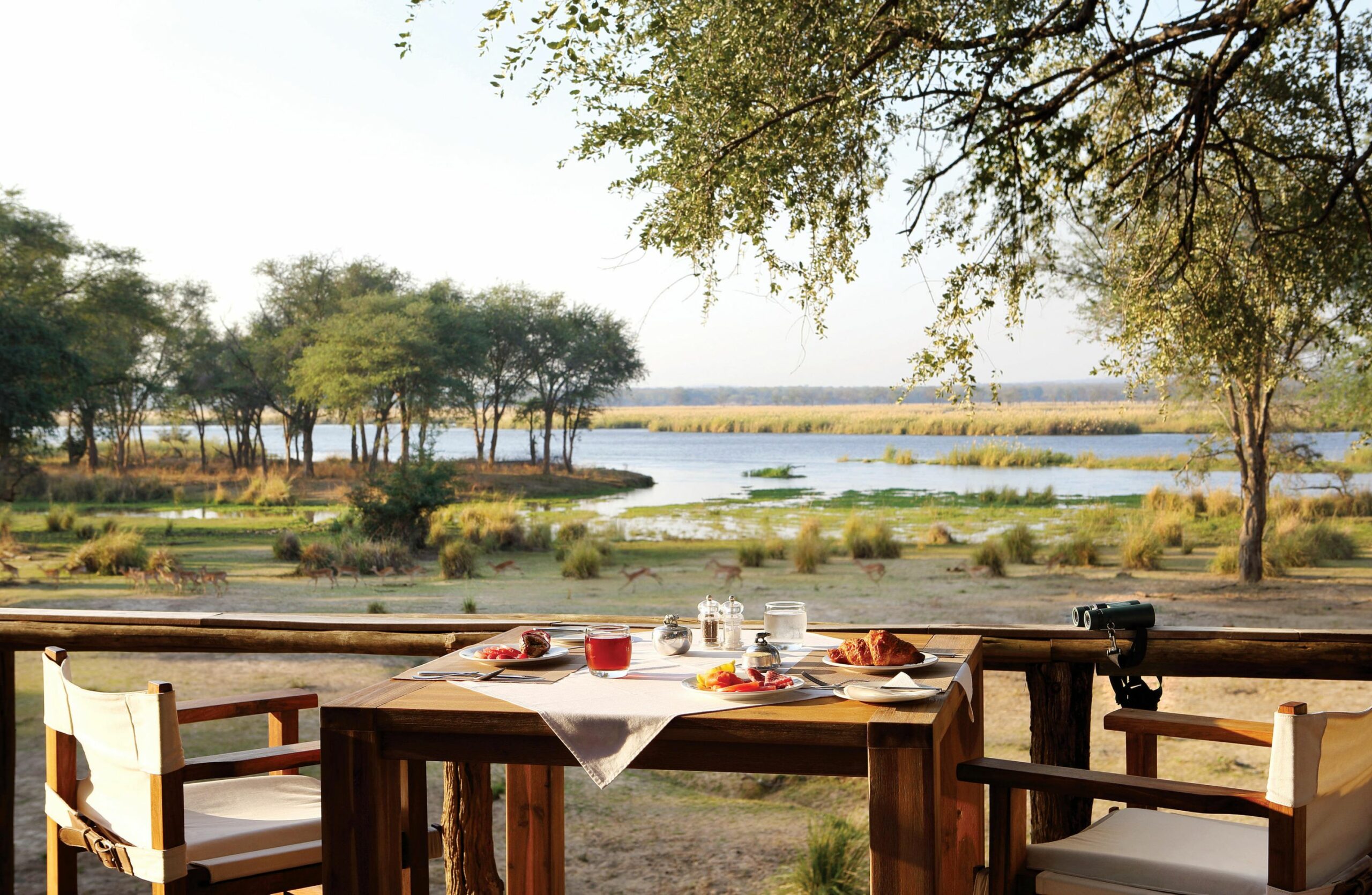 https://www.trackssafaris.co.uk/wp-content/uploads/2022/07/Breakfast-on-the-Zambezi-Deck-scaled.jpg