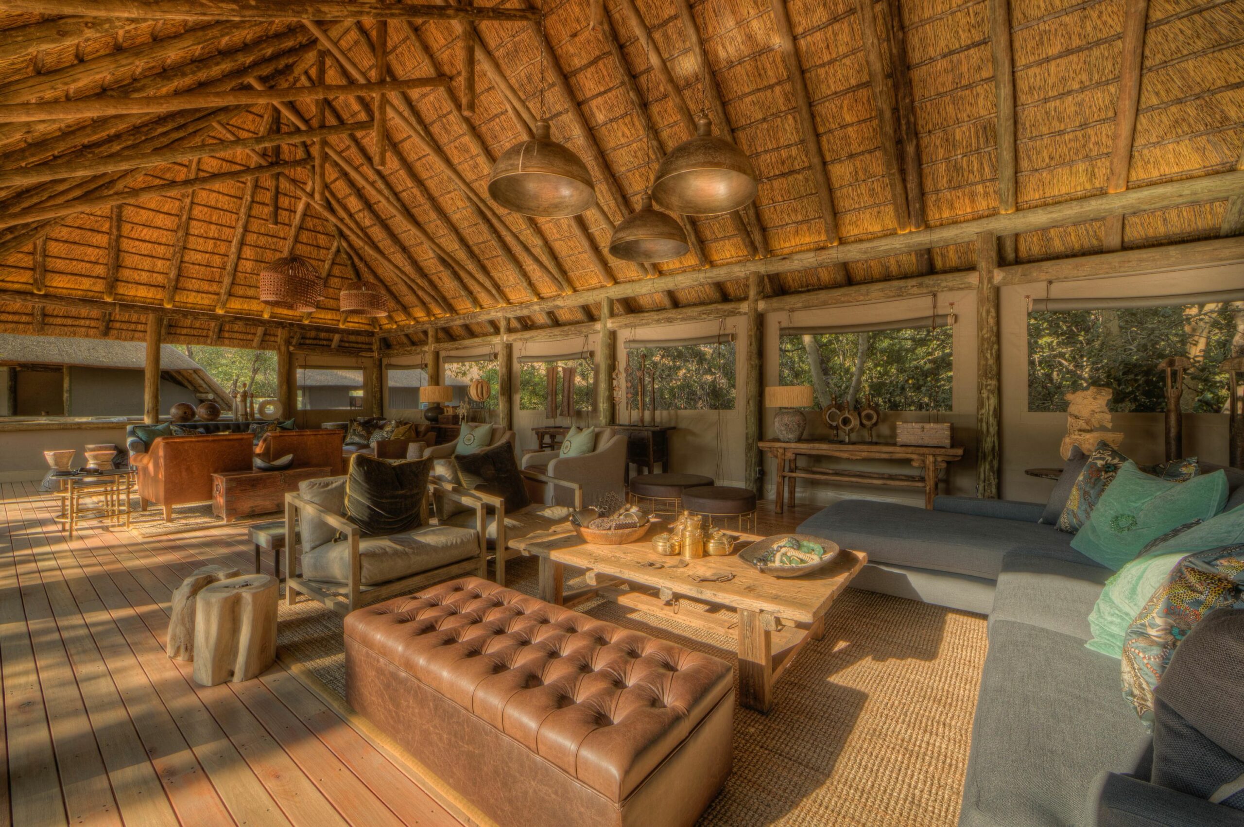 /wp-content/uploads/2022/07/Camp-Moremi-guest-lounge-area-scaled.jpg