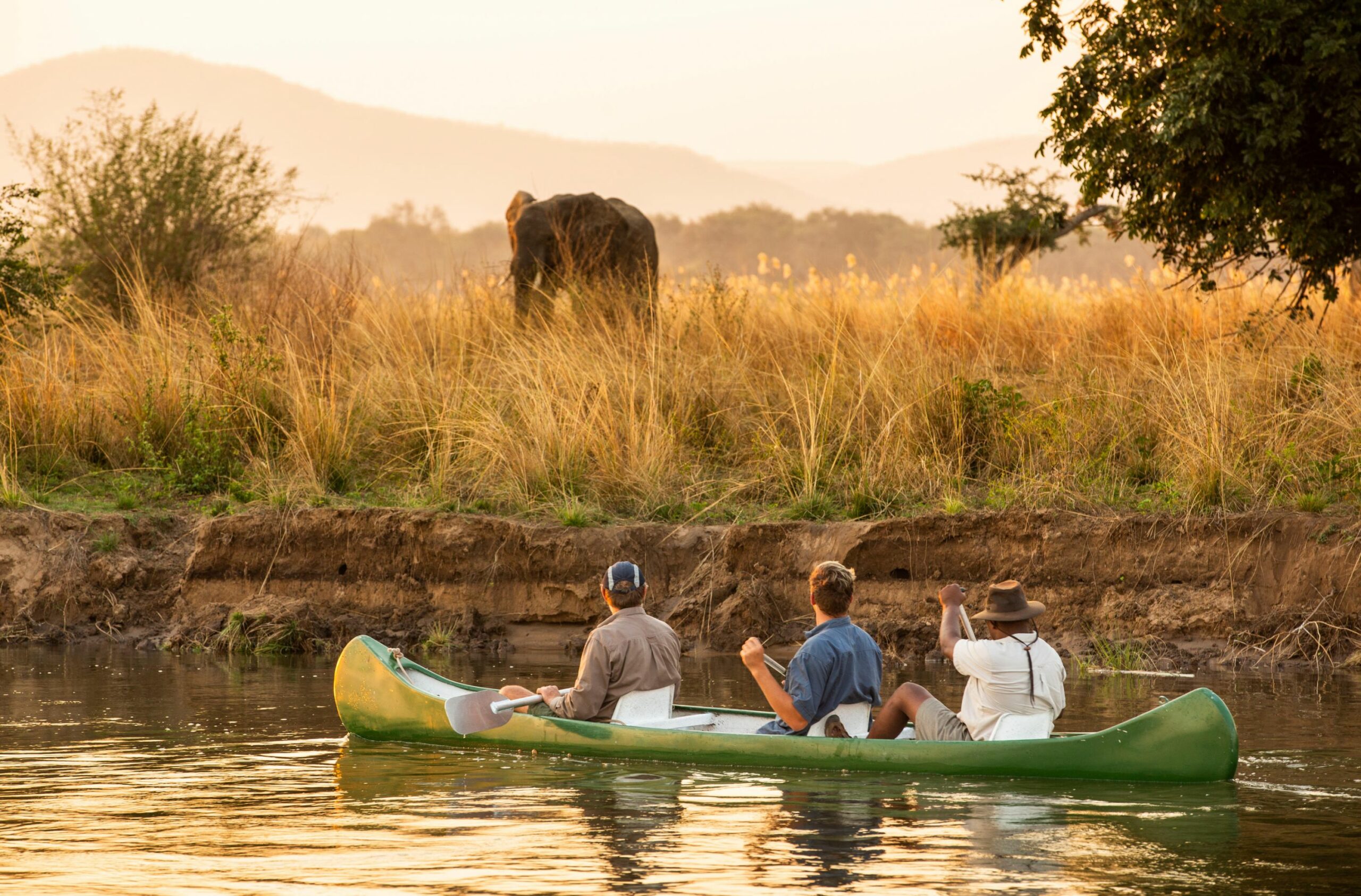 https://www.trackssafaris.co.uk/wp-content/uploads/2022/07/Canoeing-on-the-Zambezi1-scaled.jpg