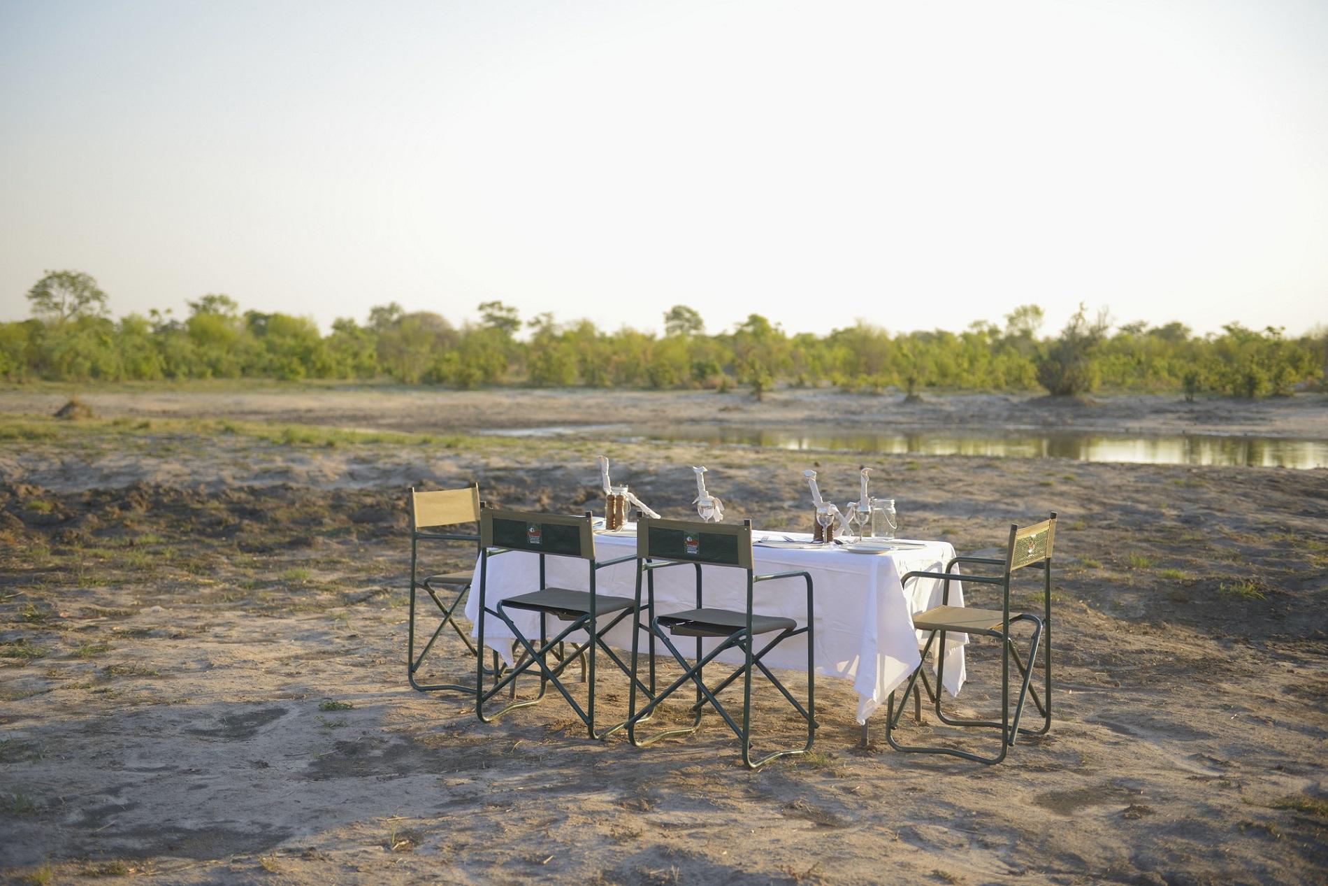 https://www.trackssafaris.co.uk/wp-content/uploads/2022/07/Experience-dinner-out-in-the-open-with-the-sounds-and-views-of-the-African-bush.jpg