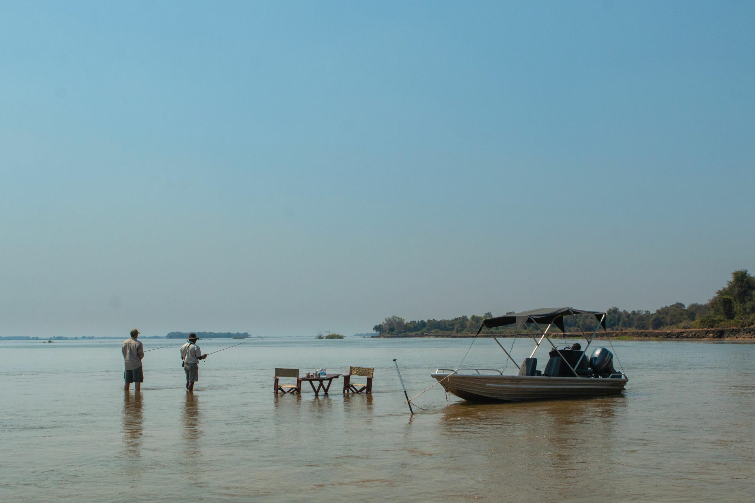https://www.trackssafaris.co.uk/wp-content/uploads/2022/07/Fishing-in-the-Zambezi-River1-1-scaled.jpg