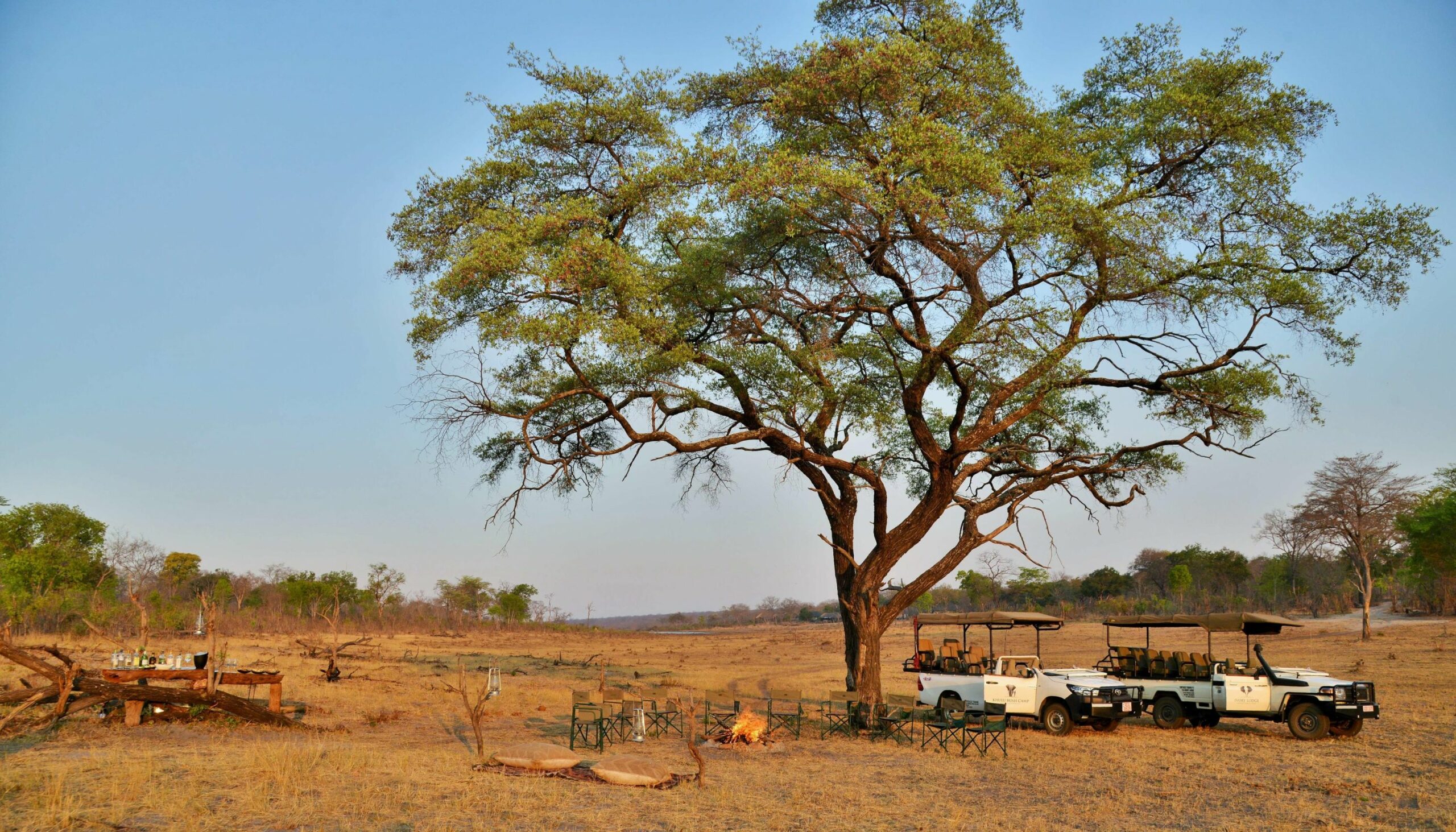 https://www.trackssafaris.co.uk/wp-content/uploads/2022/07/Khulu-Bush-Camp-Gin-Bar-Experience--scaled.jpg