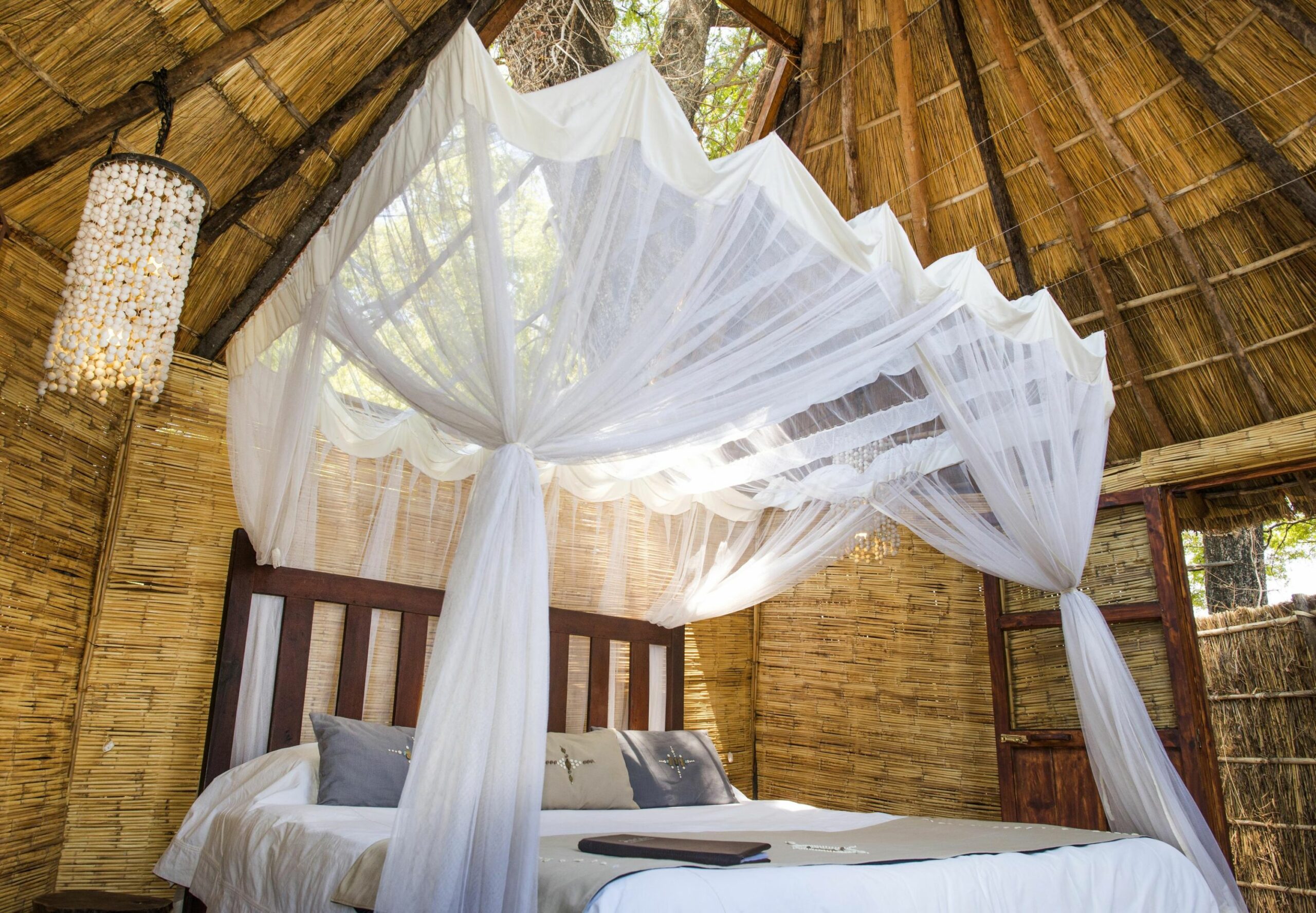 https://www.trackssafaris.co.uk/wp-content/uploads/2022/07/Mwamba-Bush-Camp-Chalets-scaled.jpg