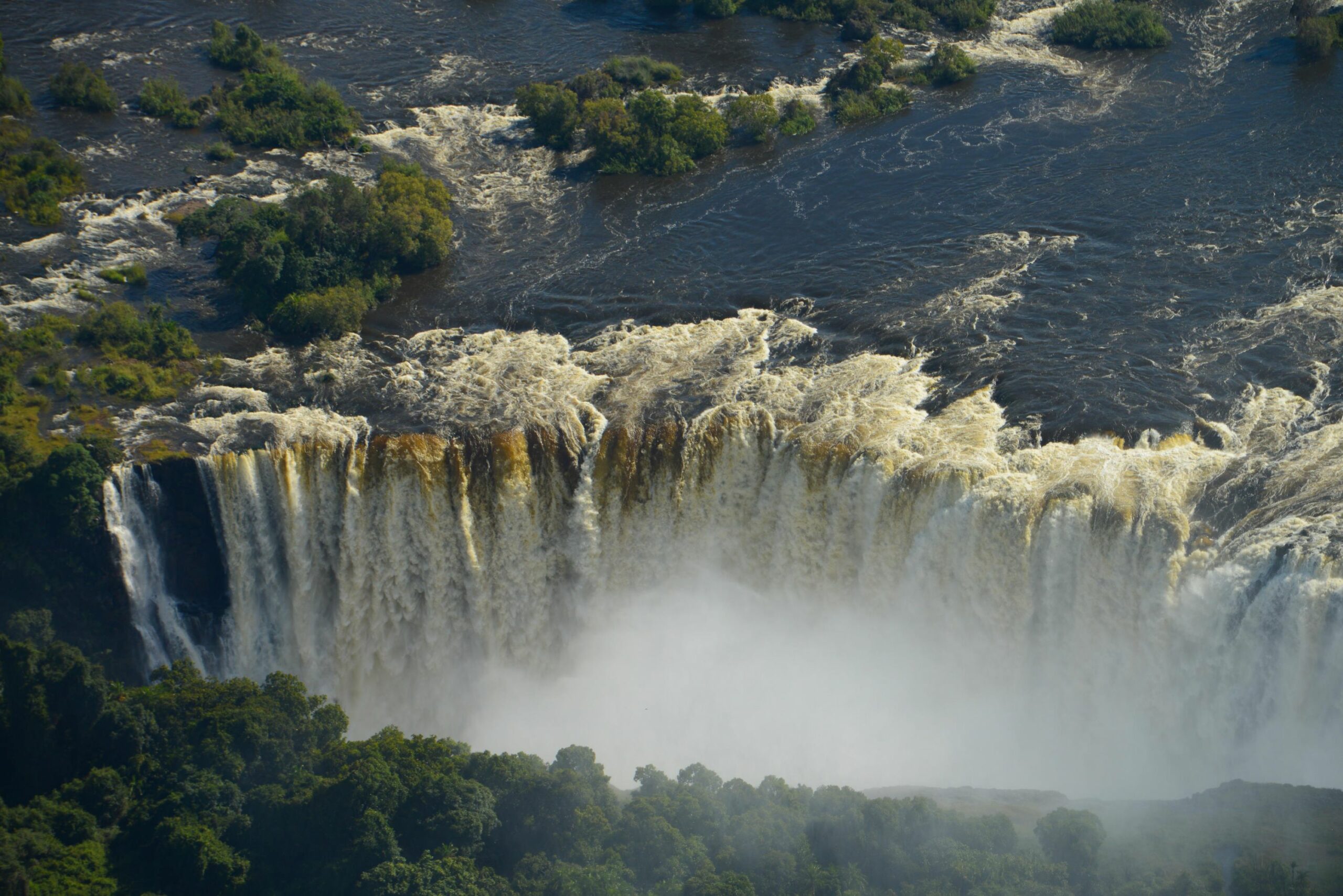 https://www.trackssafaris.co.uk/wp-content/uploads/2022/07/Old-Drift-Lodge-a-mere-7km-from-Victoria-Falls--scaled.jpg