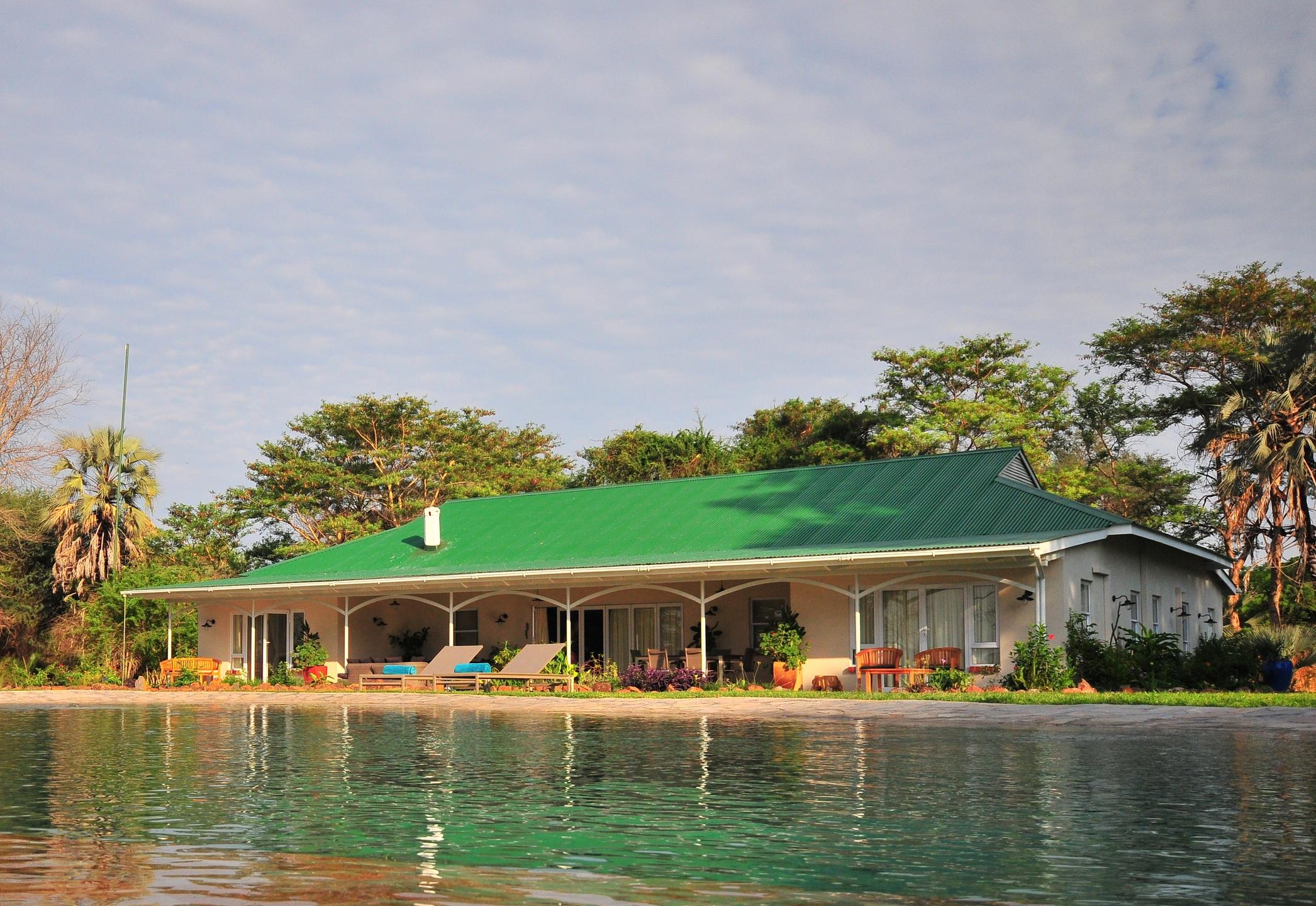 https://www.trackssafaris.co.uk/wp-content/uploads/2022/07/River-Farm-House-Waterberry.jpg