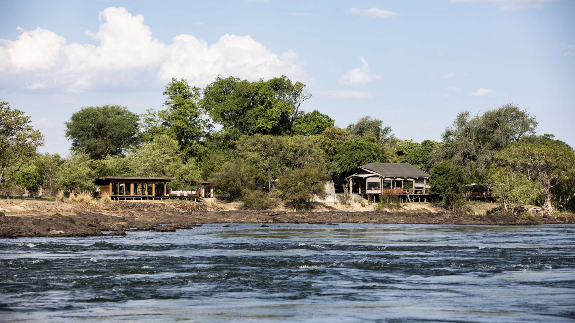 https://www.trackssafaris.co.uk/wp-content/uploads/2022/07/TOKA-LEYA-RIVER.jpg