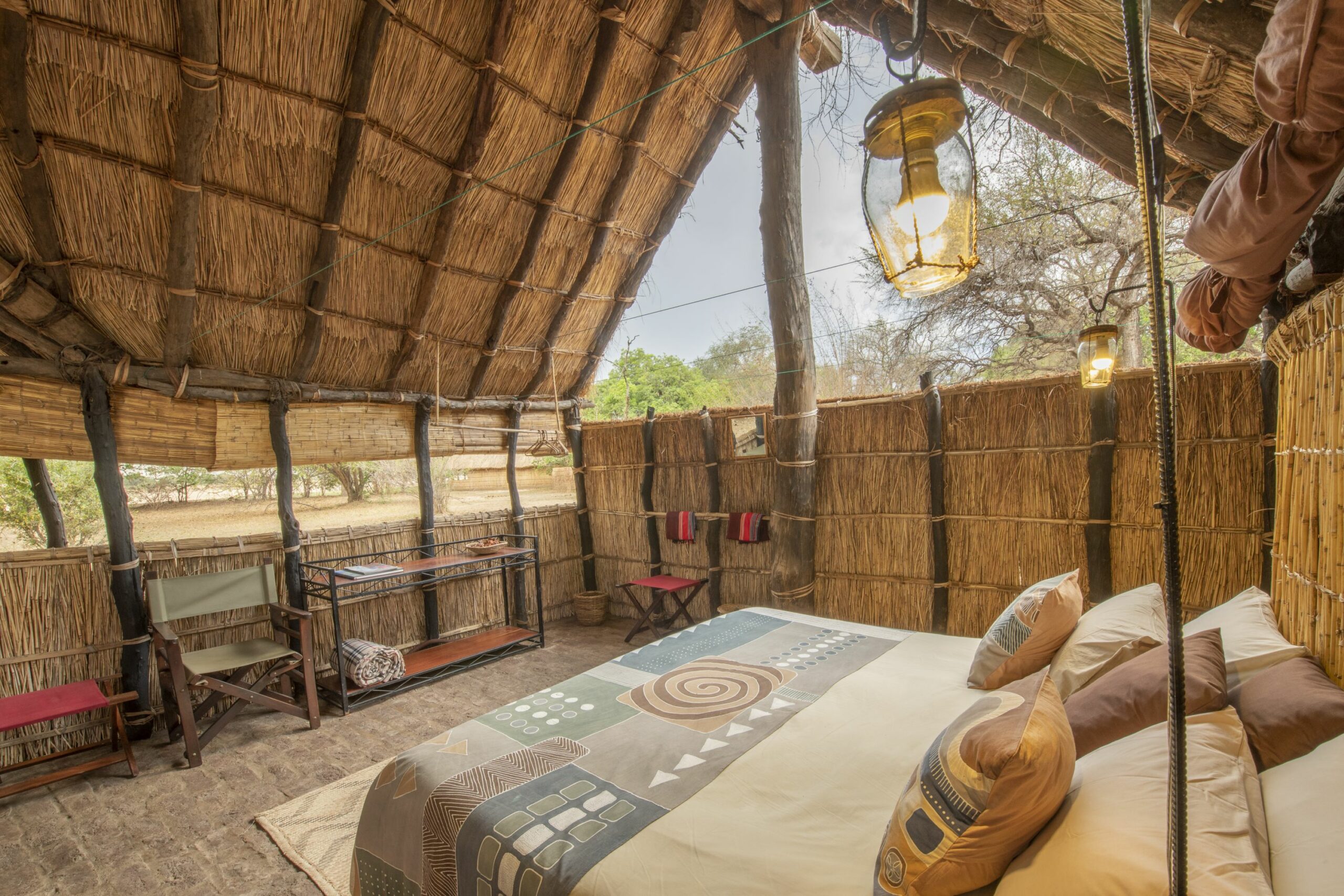 https://www.trackssafaris.co.uk/wp-content/uploads/2022/07/Tafika-Camp_family-suite-king-room-Rm5-copy-scaled.jpg