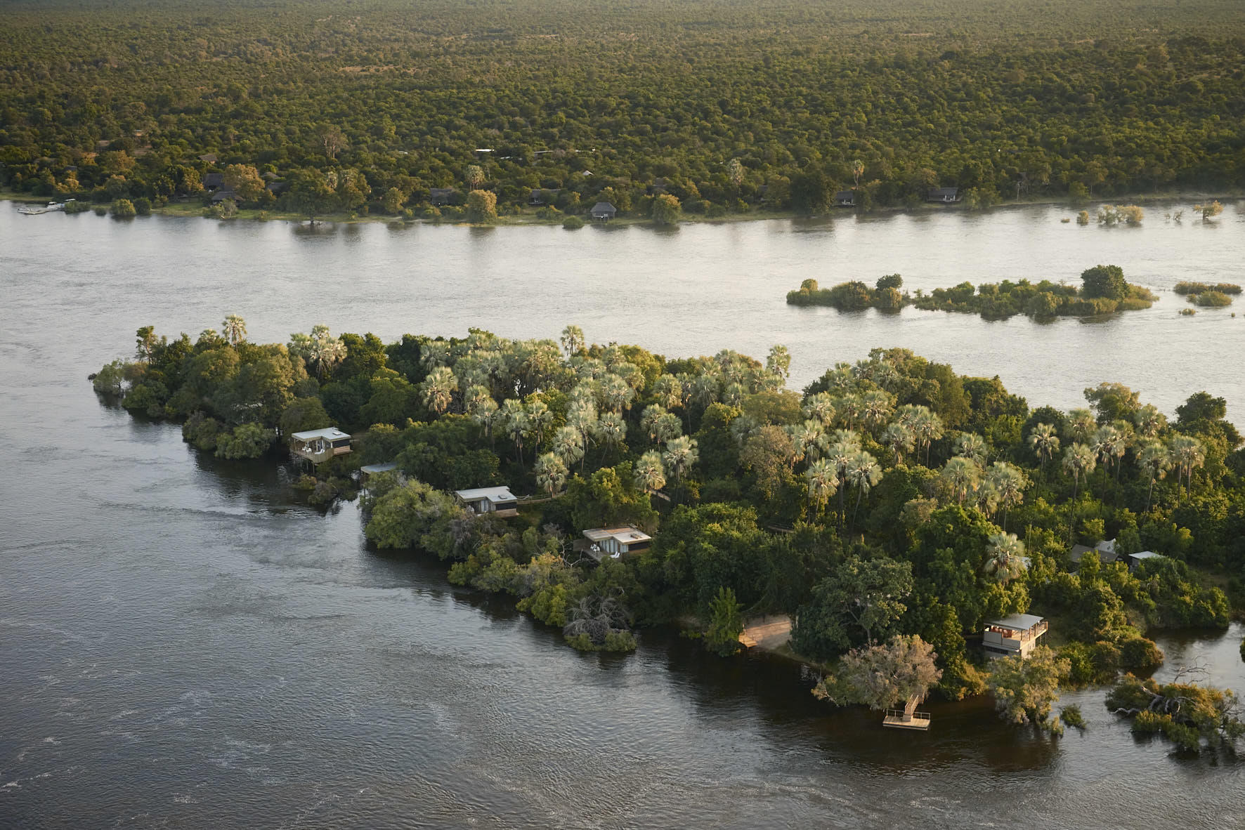 https://www.trackssafaris.co.uk/wp-content/uploads/2022/07/Victoria-Falls-River-Lodge-Island-Treehouse-Suites.jpg