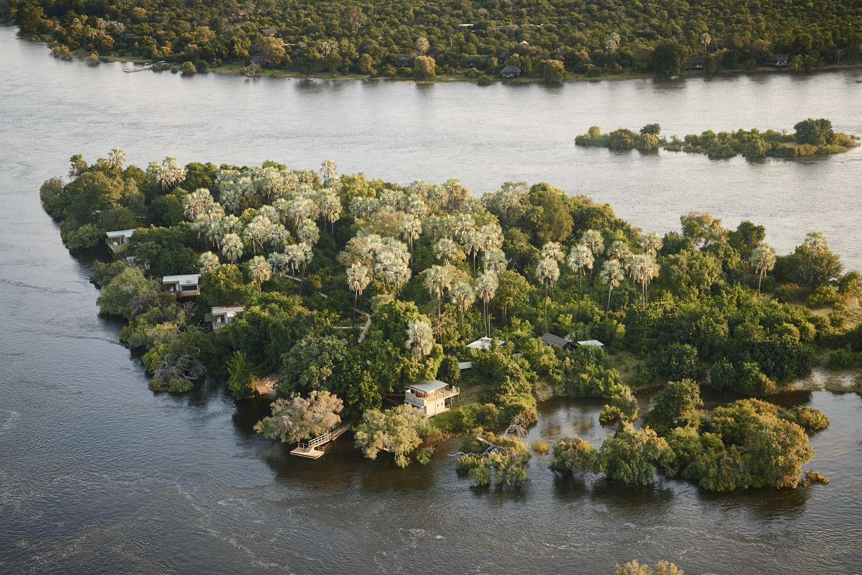 https://www.trackssafaris.co.uk/wp-content/uploads/2022/07/Victoria-Falls-River-Lodge-Island-Treehouse-Suites_1.jpg