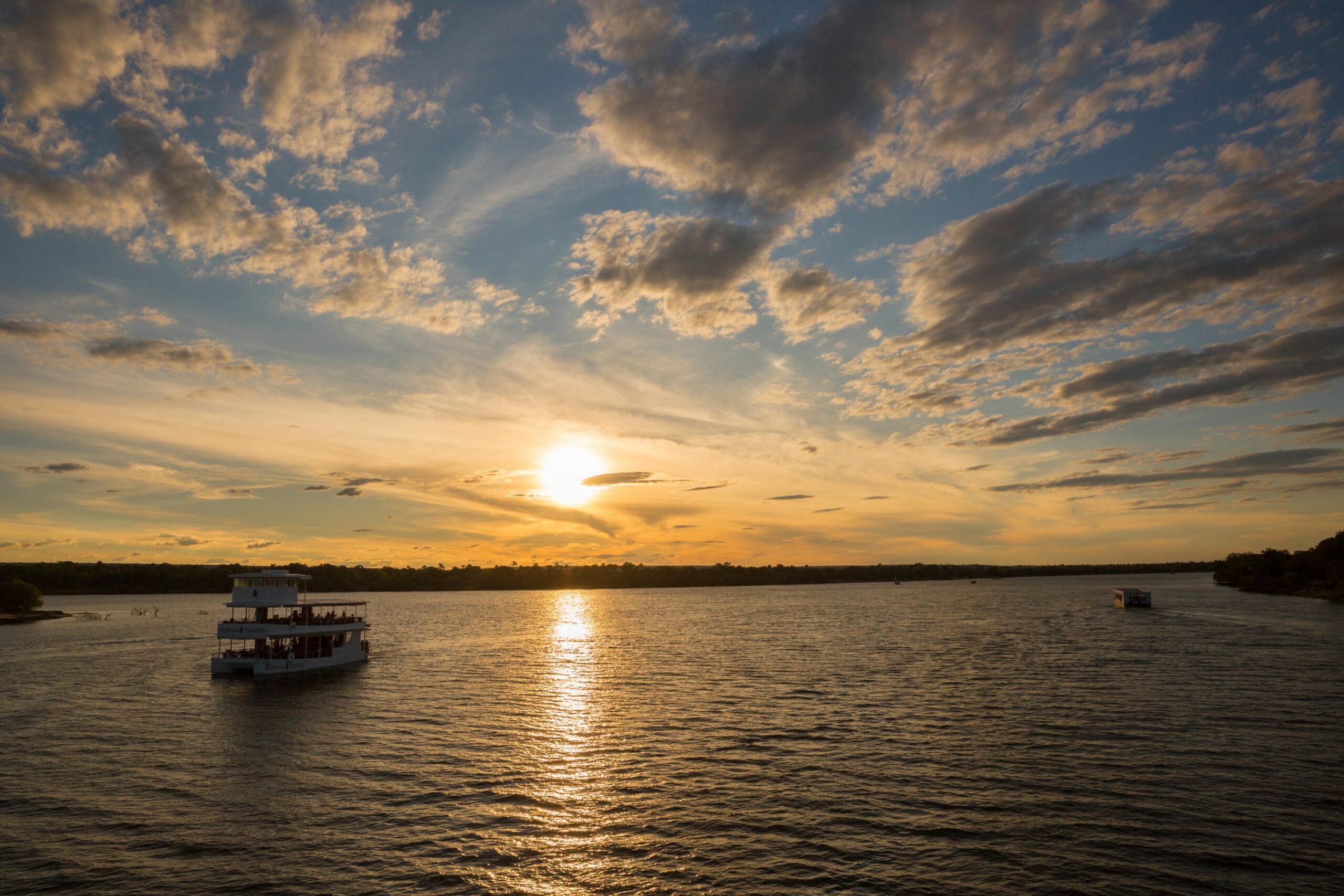 https://www.trackssafaris.co.uk/wp-content/uploads/2022/07/Zambezi-Cruise--scaled.jpg