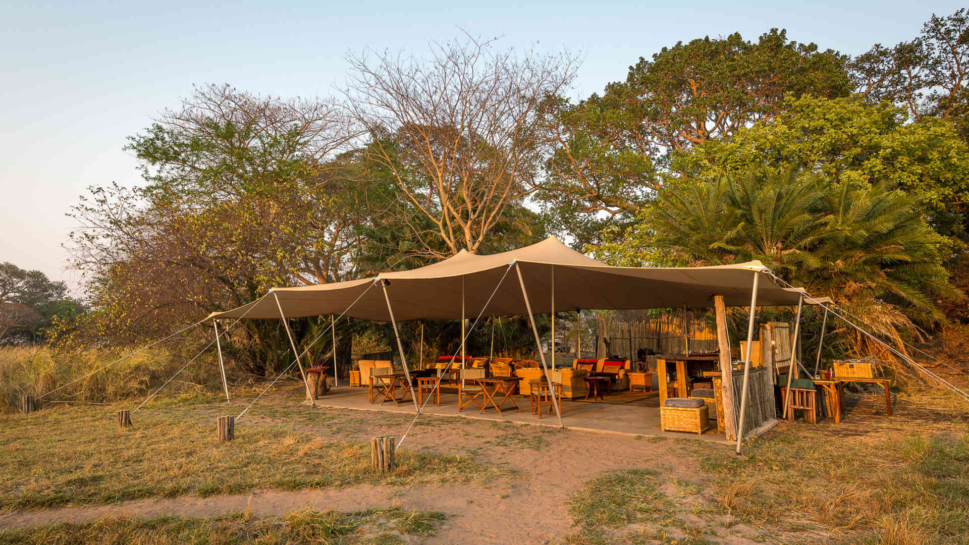 https://www.trackssafaris.co.uk/wp-content/uploads/2022/07/large_focal_3301-busanga-bush-camp.jpg