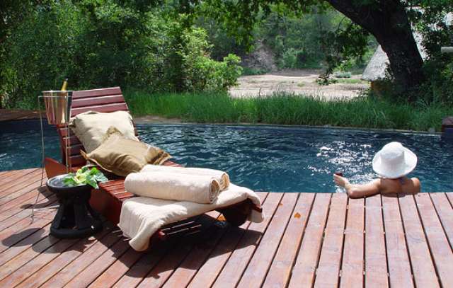 /wp-content/uploads/2022/07/rhino-post-safari-lodge-kruger-private-4.jpg